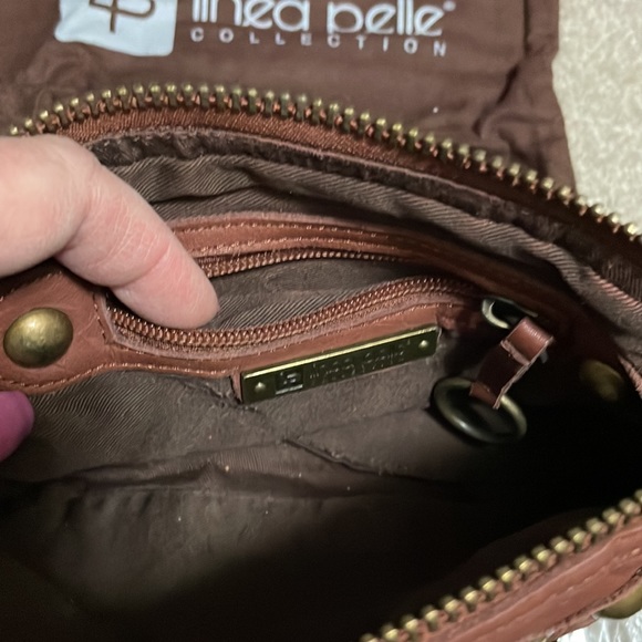 New, LINEA PELLE leather wristlet. Inside zip pocket, front zip, and top zip. - Picture 6 of 7